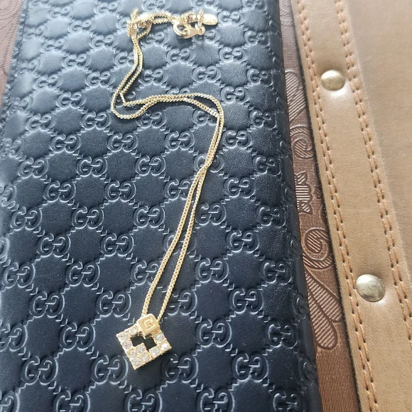 Givenchy Gold Intricate Pendant Necklace